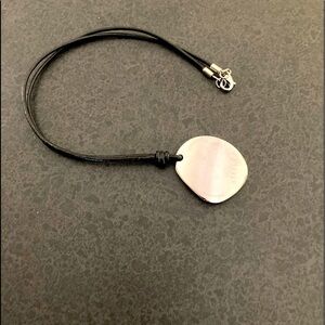 Men or women’s Pendant on Leather Cord  by Steelx excellent condition 20” cord